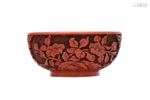A CHINESE CINNABAR LACQUER STYLE 'CAMELIA' BOWL.