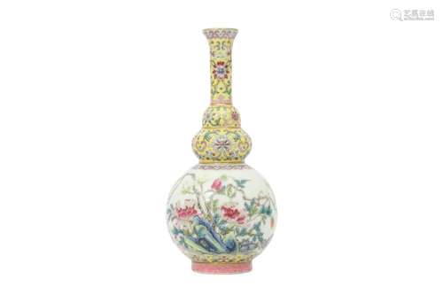 A CHINESE FAMILLE ROSE TRIPLE GOURD VASE.