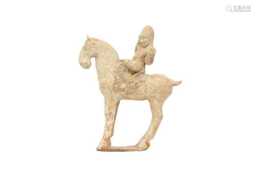 A CHINESE POTTERY MODEL OF A HORSE AND RIDER.