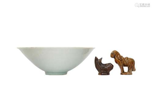 A CHINESE QINGBAI BOWL AND TWO GLAZED POTTERY ANIMALS.