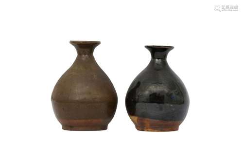 TWO CHINESE POTTERY BOTTLE VASES.