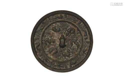 A CHINESE BRONZE MIRROR.