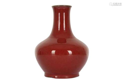 A CHINESE COPPER RED-GLAZED VASE.