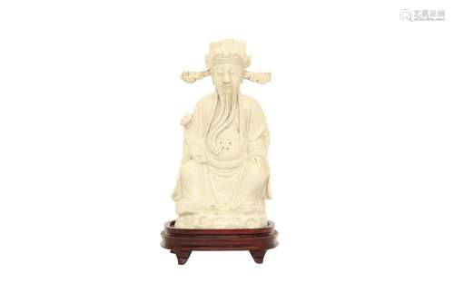 A CHINESE BLANC-DE-CHINE FIGURE OF CAISHEN.