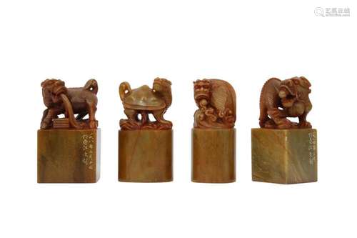 A SET OF FOUR CHINESE SOAPSTONE SEALS.