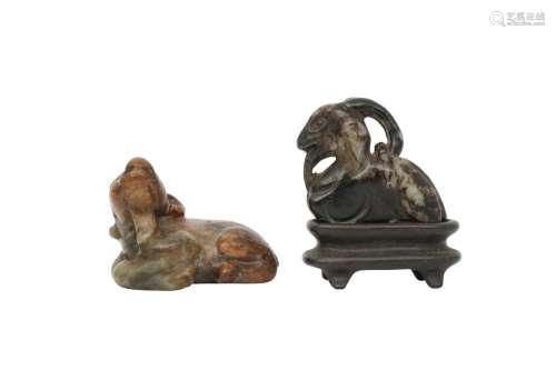 TWO CHINESE JADE CARVINGS OF RAMS.