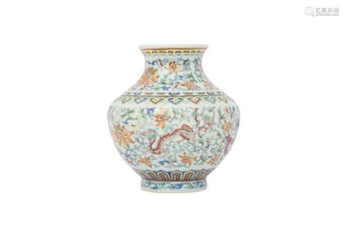 A CHINESE DOUCAI 'DRAGON AND LOTUS' VASE.