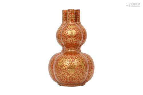 A CHINESE CORAL-GROUND GILT-DECORATED TRIPPLE-NECKED GOURD V...