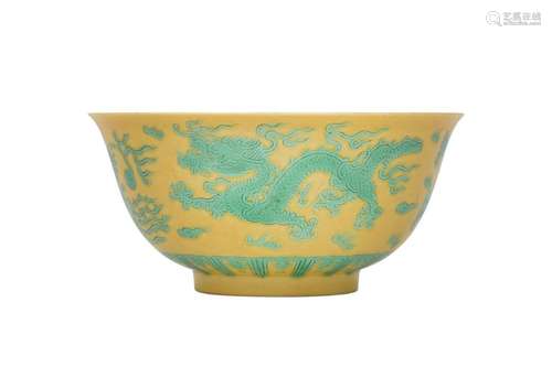 A CHINESE GREEN-ENAMELLED YELLOW-GROUND 'DRAGON AND PHOE...