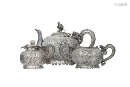 A CHINESE THREE PIECE SILVER TEA SET.