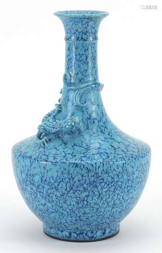 Chinese porcelain vase having a blue glaze decorated in reli...
