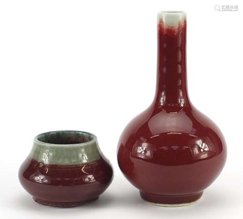Chinese porcelain vases having sang de boeuf glazes, the lar...