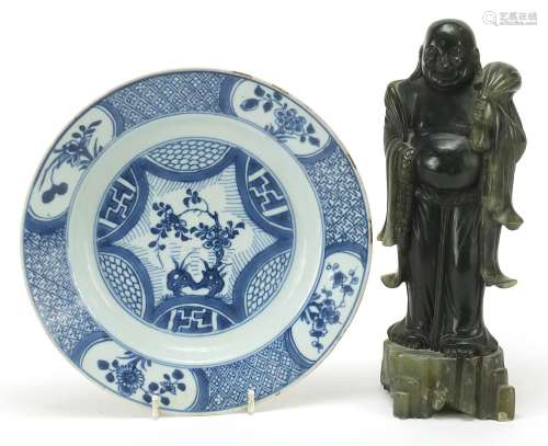 Chinese green stone carving of standing Buddha and a blue an...