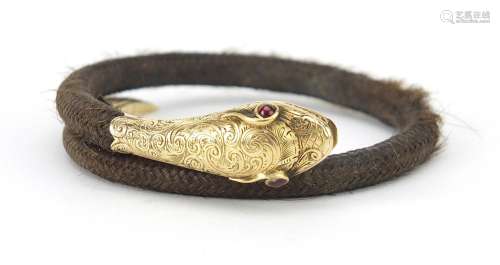Antique unmarked gold and plaited hair serpent bracelet with...
