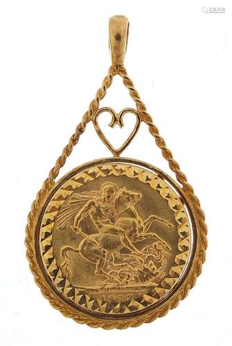 George V 1913 gold sovereign with 9ct gold pendant mount, 4....