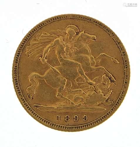 Queen Victoria 1899 gold half sovereign housed in an antique...