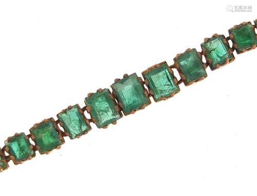 Antique unmarked gold graduated emerald bracelet, 18cm in le...