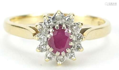 18ct gold ruby and diamond flower head ring, size P, 3.5g