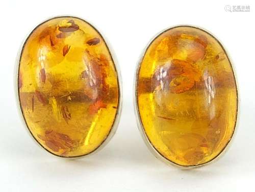 Pair of 9ct gold cabochon amber stud earrings, 1.4cm high, 2...