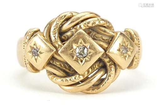 18ct gold diamond three stone knot design ring, size N, 8.5g