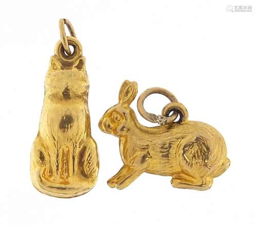 Two 9ct gold charms of a seated cat and a hare, the largest ...