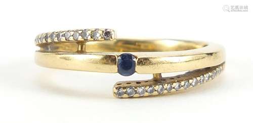 18ct gold diamond and sapphire crossover ring, size R, 6.2g