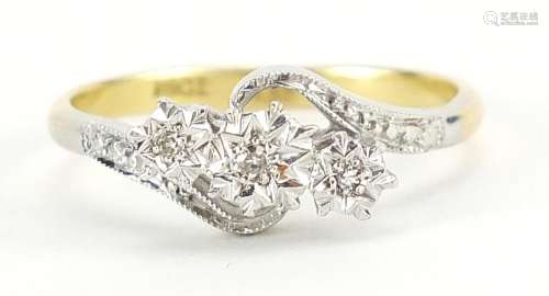 18ct gold and platinum diamond three stone crossover ring, s...