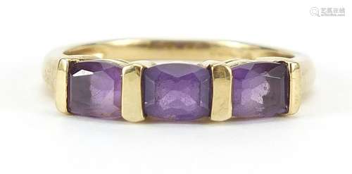 9ct gold amethyst three stone ring, size N, 2.2g