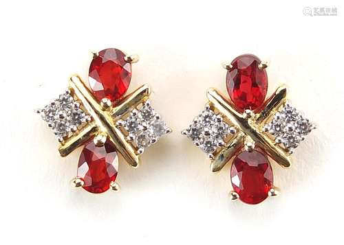 Pair of red and clear stone stud earrings, 1cm high, 2.5g