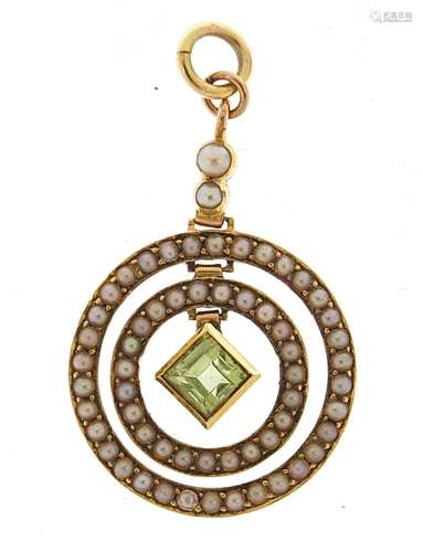 9ct gold Edwardian peridot and seed pearl halo pendant, 3.4c...