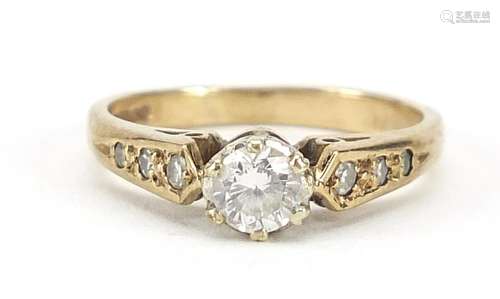 9ct gold diamond solitaire ring with diamond set shoulders, ...