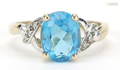 9ct gold diamond and blue topaz ring, size P, 2.8g