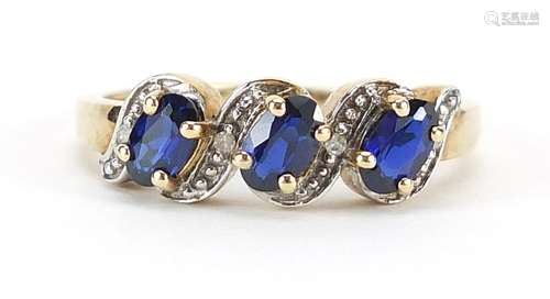 9ct gold sapphire and diamond three stone crossover ring, si...