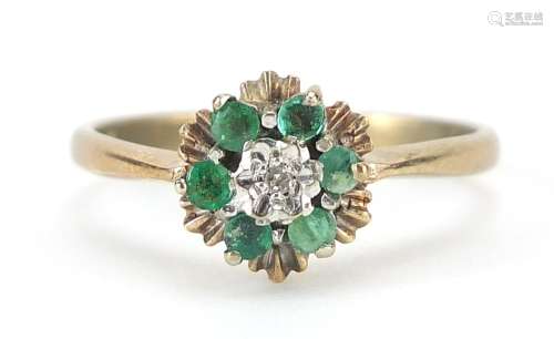 9ct gold emerald and diamond flower head ring, size N/O, 2.7...