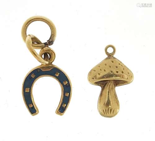 14ct gold enamelled horseshoe charm and an unmarked gold toa...