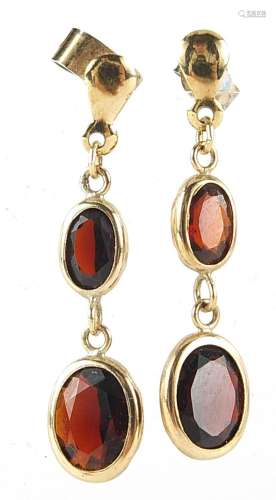 Pair of 9ct gold garnet drop earrings, 3cm high, 1.6g
