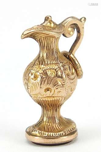 9ct gold wine ewer charm with carnelian base, 2cm high, 1.9g