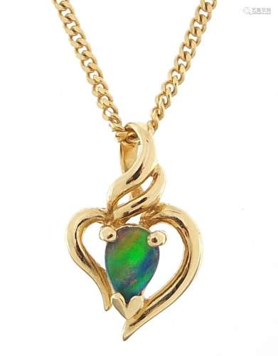 14ct gold opal love heart pendant on a 9ct gold necklace, 1....