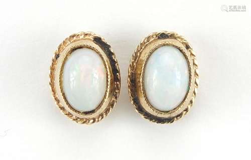 Pair of 9ct gold cabochon opal stud earrings, 9mm high, 1.9g