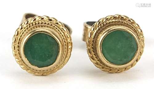 Pair of 9ct gold emerald stud earrings, 7mm in diameter, 1.5...