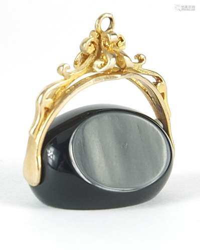 9ct gold black onyx spinner fob, 2.2cm wide, 5.5g