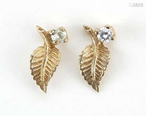Pair of 9ct gold cubic zirconia leaf design stud earrings, 1...