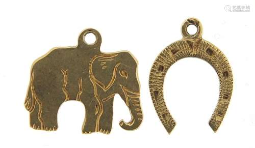 Two unmarked gold charms comprising an elephant and horsesho...