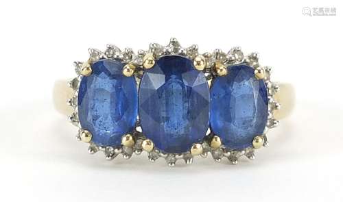 9ct gold diamond and blue stone three stone ring, possibly t...