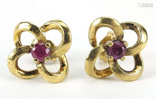 Pair of 18ct gold ruby flower head design stud earrings, 1.3...