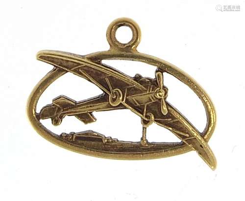 14ct gold bi plane charm, 1.3cm in length, 0.6g