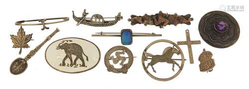 Antique and later silver brooches including galloping horse,...