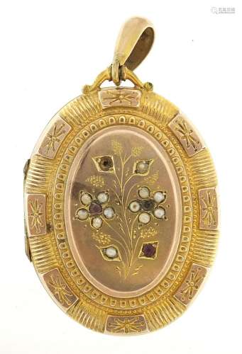 Large antique gilt metal locket set with garnets and seed pe...