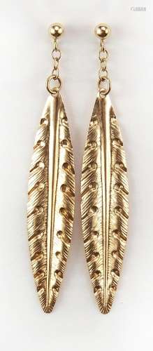 Pair of unmarked gold leaf design drop earrings, (tests as 9...