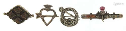 Four silver Scottish brooches including Iona heart example a...